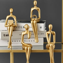 Golden Abstract Figurines
