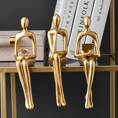 Golden Abstract Figurines